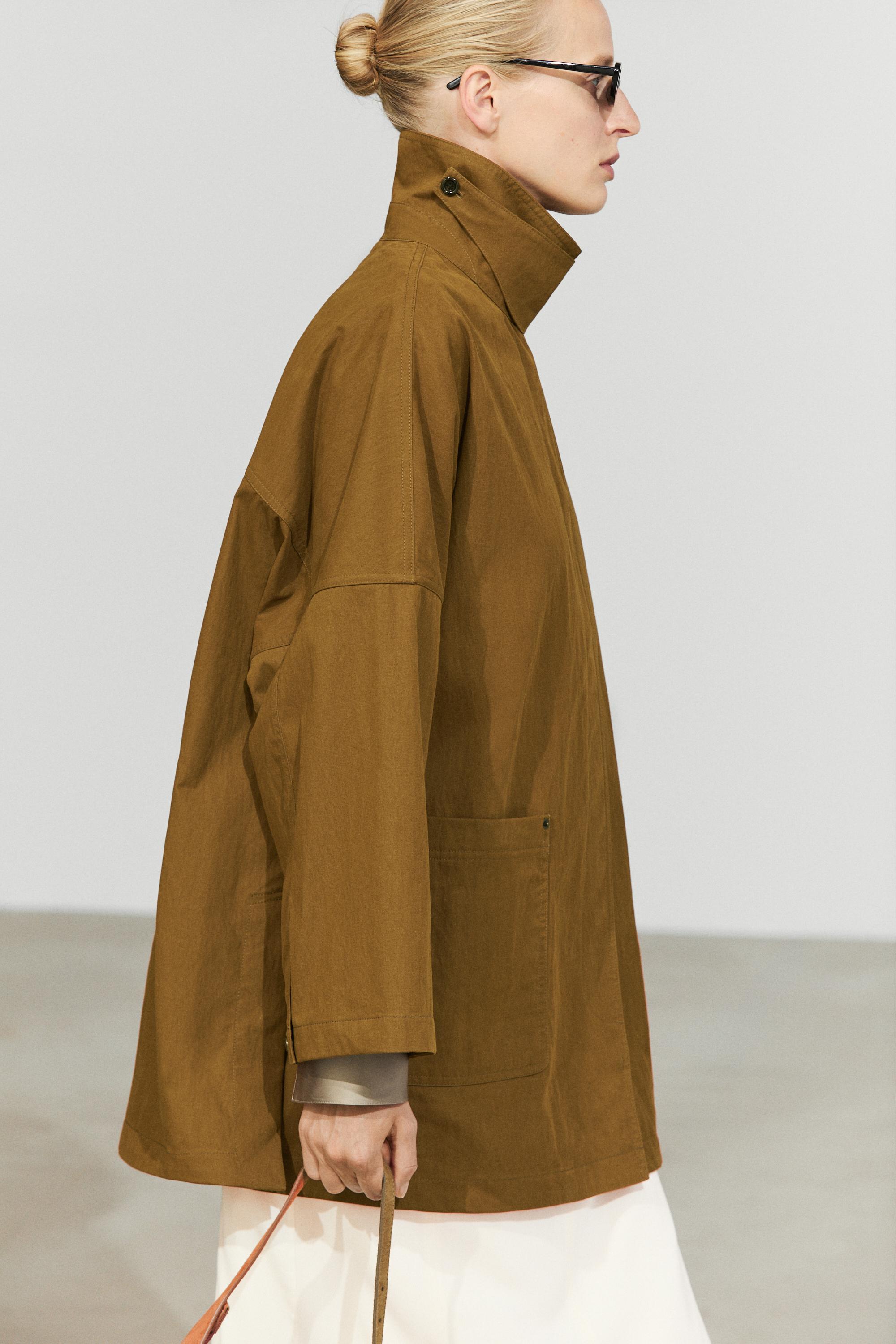 Button-tab cape jacket